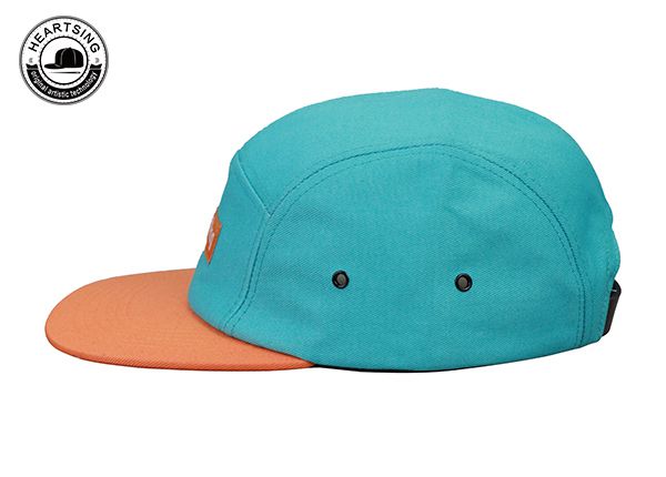 Side of Green and Orange 5 Panel Leather Strap Hat With a Leather Patch