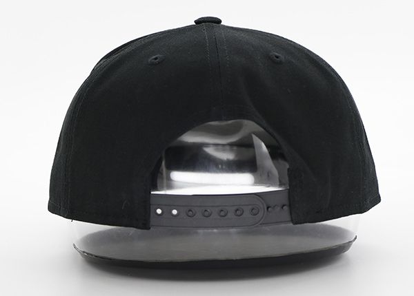 Back of All Black Snapback Hat With Leather Label