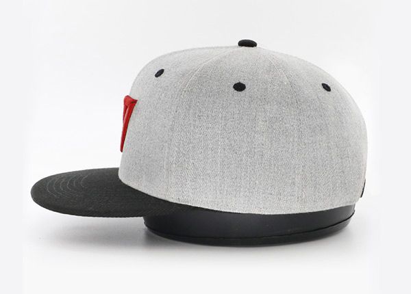 Side of Black and Grey Embroidered Snapback With Flat Bill