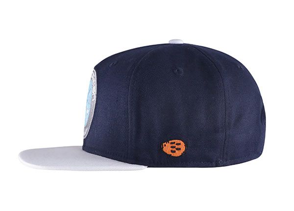 Side of Navy Blue and Grey Snapback With Embroidered Patch