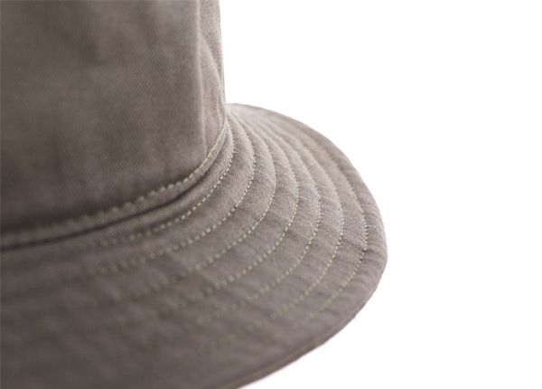 Brim of Khaki Bucket Hat with a Patch Logo