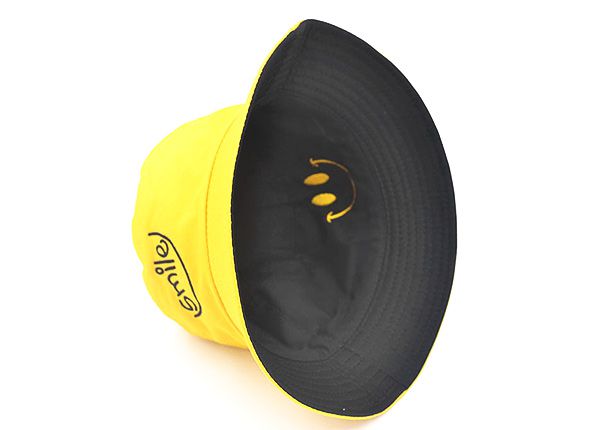Inside of Reversible Yellow Bucket Hat with a Smile Logo