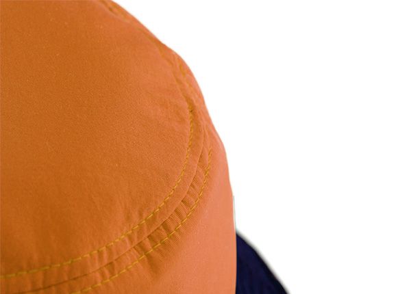 Slant of Orange Cotton Anime Bucket Hat Featuring a Chinese Word Logo and a Navy Brim 
