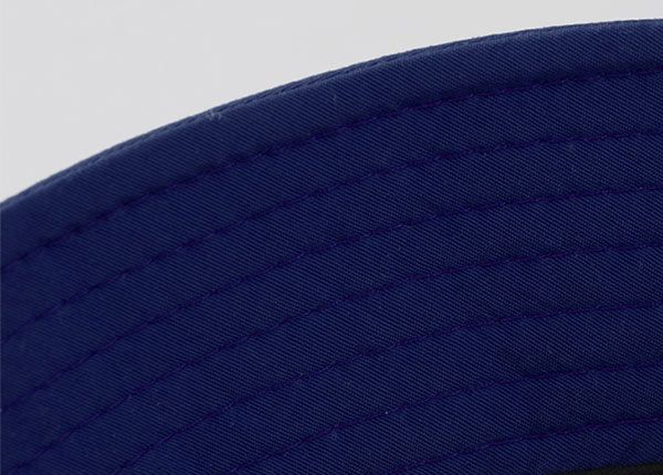 Stitching of Orange Cotton Anime Bucket Hat Featuring a Chinese Word Logo and a Navy Brim 