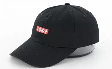 What are the Differences Between Polyester and Cotton Caps?